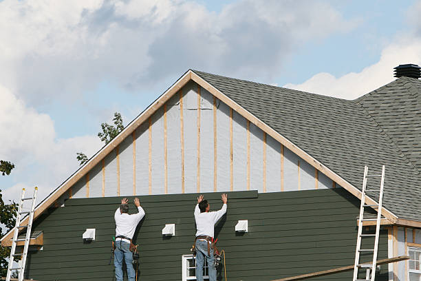 Professional Vinyl Siding technician working in Fayetteville, OH